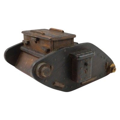 Lot 149 - A 1941 dated wooden money box in the form of a...