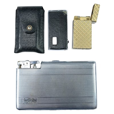 Lot 673 - A 1950s Polo chrome lighter and cigarette...