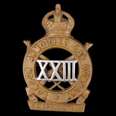 Lot 93 - A 23rd London Armoured Car Company cap badge