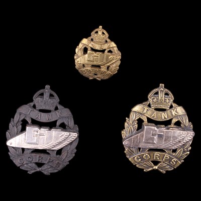 Lot 103 - Two tank corps officers' cap badges, together...