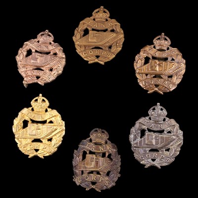 Lot 105 - Five Tank Corps cap badges