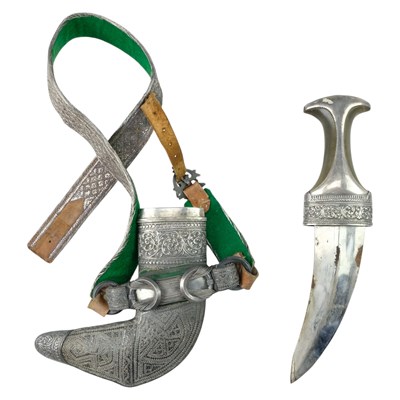 Lot 323 - A Middle Eastern silver-mounted jambiya dagger...