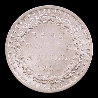 Lot 604 - A George III 1811 three shillings silver bank...