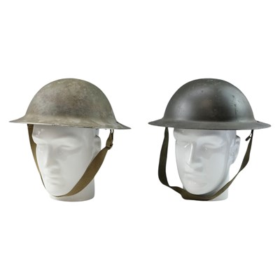 Lot 299 - A Second World War British Mk 2 steel helmet,...