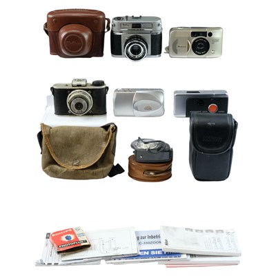 Lot 722 - A group of cameras and accessories, including...