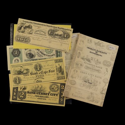 Lot 482 - Three reference guides to banknotes of the...