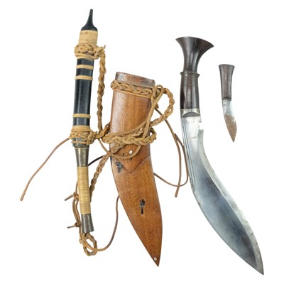 Lot 324 - A Nepalese kukri in chip-carded hardwood...