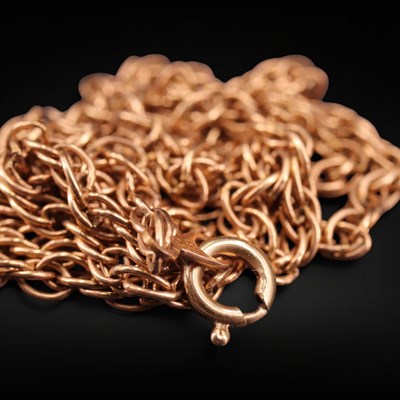 Lot 1263 - A vintage 9 ct yellow metal rope-link neck...
