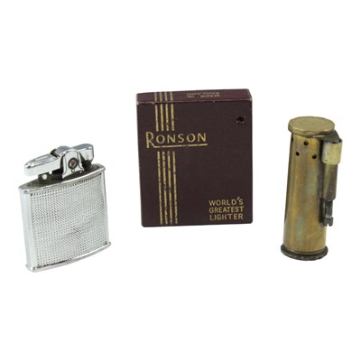 Lot 554 - A Ronson Cadet cigarette lighter, together...