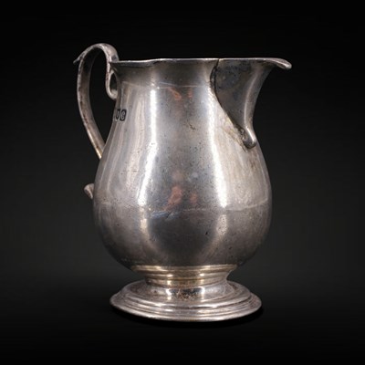 Lot 1156 - A late Victorian silver baluster cream...