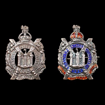 Lot 141 - Two King's Own Scottish Borderers white-metal...