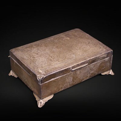 Lot 1162 - An Art Deco influenced silver table cigarette...
