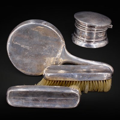 Lot 1163 - A 1920s silver four-piece matched dressing...