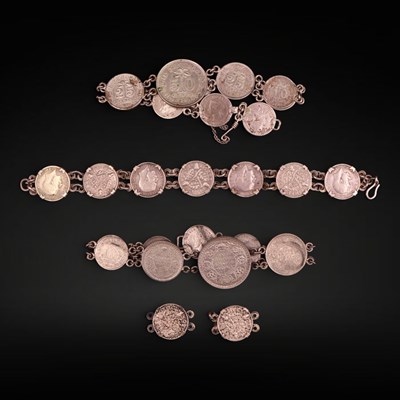 Lot 1222 - Three early-to-mid 20th Century coin bracelets,...