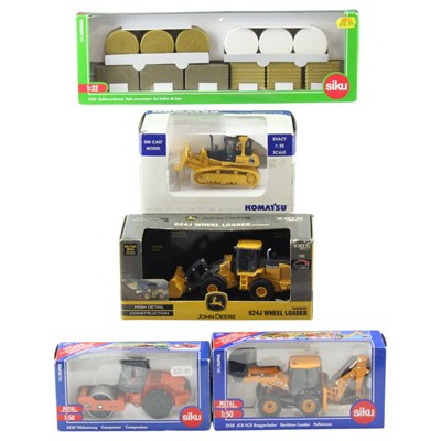 Lot 720 - A small group of diecast toy construction...