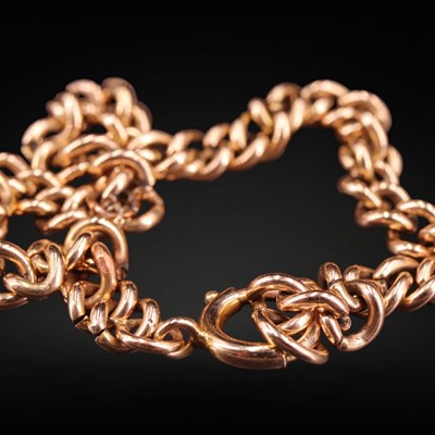 Lot 1272 - A vintage 9 ct gold curb-link bracelet, 18 cm,...