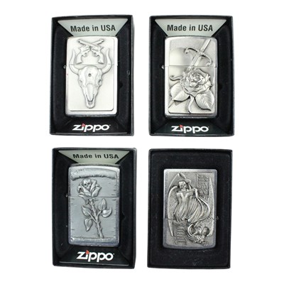 Lot 544 - Four boxed Zippo lighters, comprising "Skull...