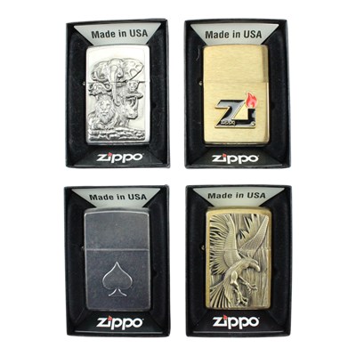 Lot 545 - Four boxed Zippo lighters, comprising "Ace of...
