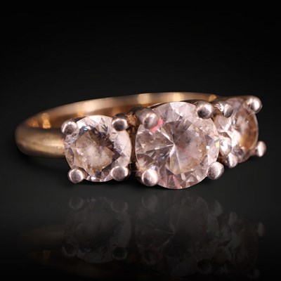 Lot 1278 - A near-contemporary three-stone...