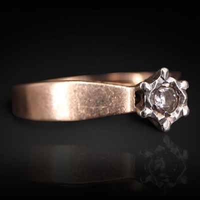 Lot 1284 - A 1970s diamond solitaire ring, comprising a...