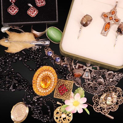 Lot 1230 - A group of gemstone-set silver / white metal...
