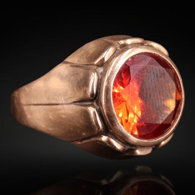 Lot 1301 - A near-contemporary blood-orange sapphire...
