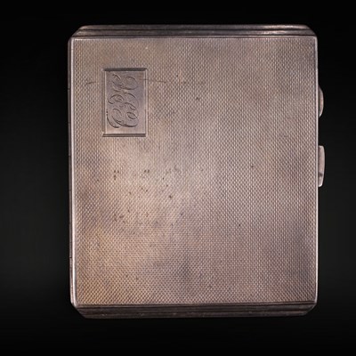 Lot 1183 - A 1941 Art Deco influenced silver cigarette...