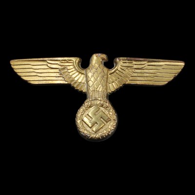 Lot 173 - A German Third Reich political cap eagle, RZM...