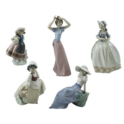 Lot 1000 - Five Nao figurines of young girls, tallest 28 cm