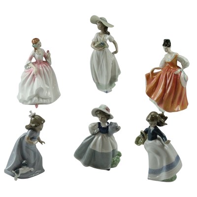 Lot 1001 - Four boxed Nao figurines of young girls,...