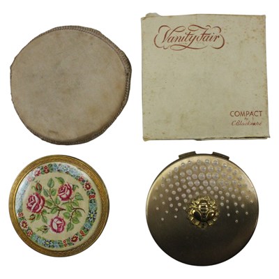 Lot 823 - A vintage Vanity Fair powder compact, together...