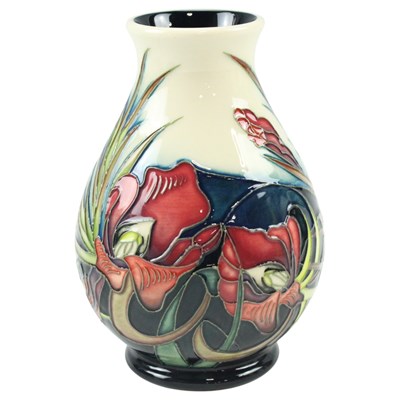 Lot 950 - A boxed Moorcroft "Satin Flower" baluster vase,...