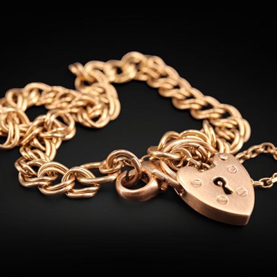 Lot 1243 - A 1920s 9 ct gold double belcher-link bracelet,...