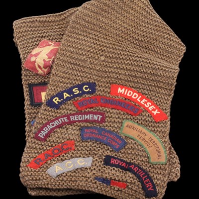 Lot 164 - A mid 20th Century nurse's khaki wool scarf,...