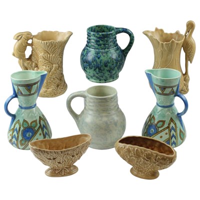 Lot 910 - A small collection of Sylvac vases and flower...