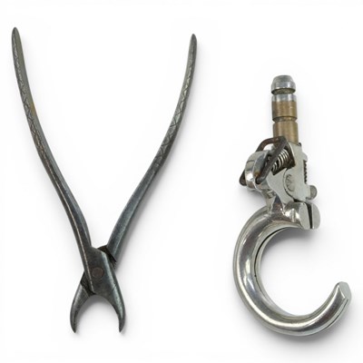 Lot 499 - A pair of vintage dental extraction forceps,...