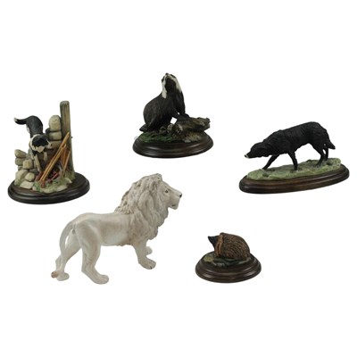 Lot 1005 - A group of animal figurines, including two...