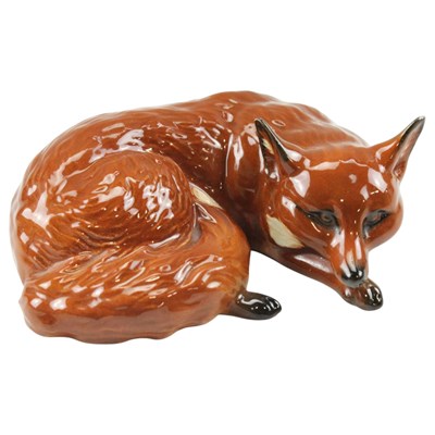 Lot 1013 - A Beswick curled fox, model 1017, 10.5 cm