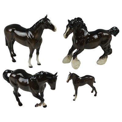 Lot 1021 - A group of Beswick brown horses, including a...