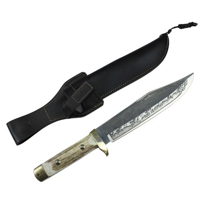 Lot 557 - A Linder 440 Bowie knife, having an etched...