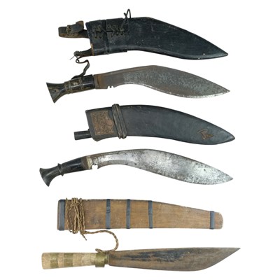 Lot 245 - A horn-handled kukri in a military-style...