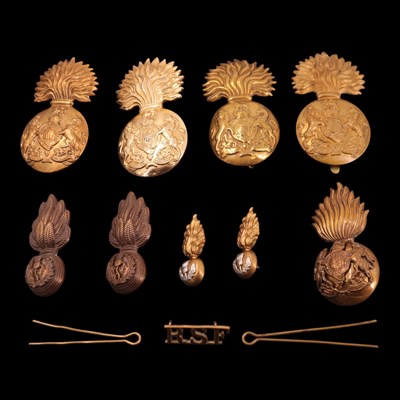 Lot 129 - A group of Royal Scots Fusiliers cap badges,...