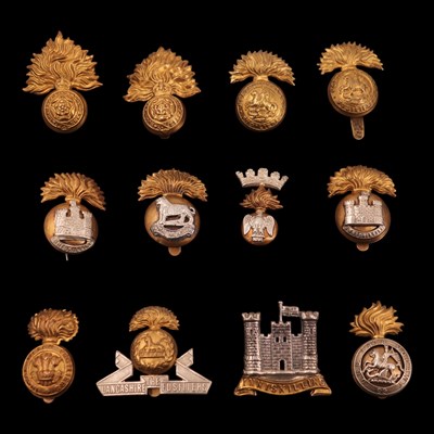 Lot 130 - A group of Fusilier regiment cap badges,...