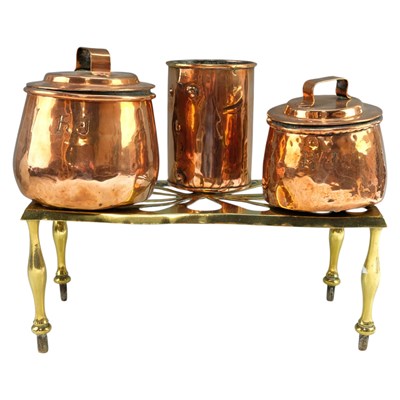Lot 851 - A Victorian brass trivet, together with two...