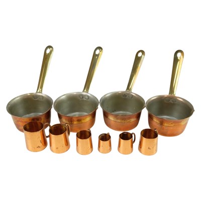 Lot 843 - A group of four miniature copper 2 oz...