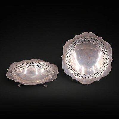 Lot 1108 - A pair of 1920s silver dishes, each having a...