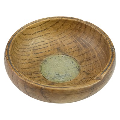Lot 213 - A small turned wooden bowl made from timber...