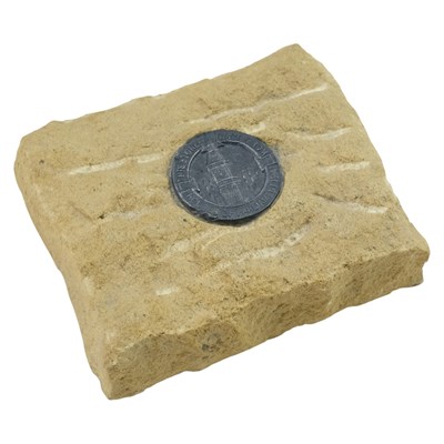Lot 227 - A paperweight of stone salvaged from the...