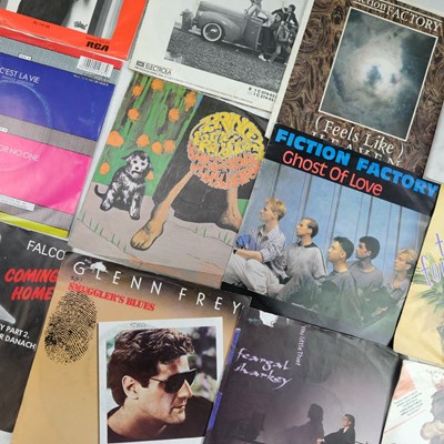 Lot 670 - A group of 45 rpm vinyl record singles,...