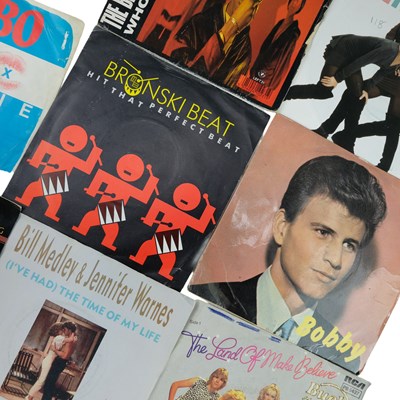 Lot 671 - A group of 45 rpm vinyl record singles,...